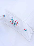 Bedlinen with red embroidery