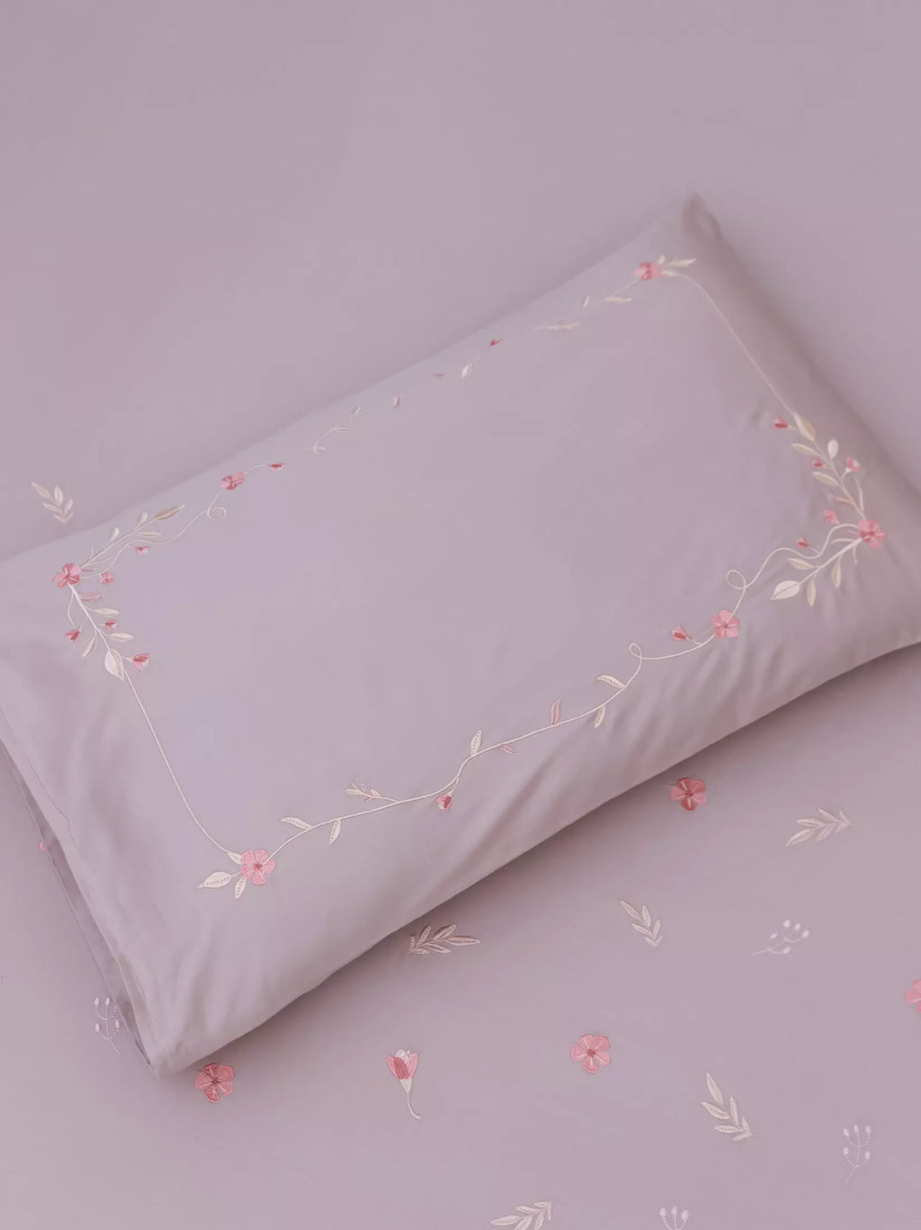 Mauve Bedsheet set with floral and vines embroidery pillow cover