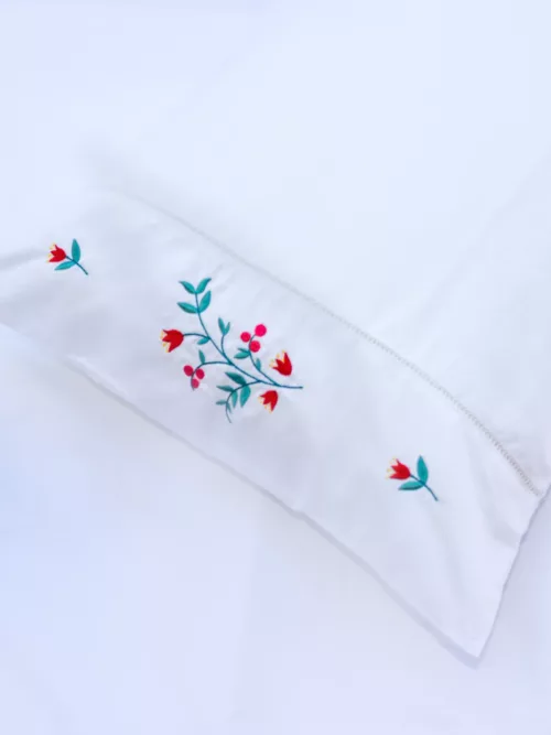 Bedlinen with red embroidery