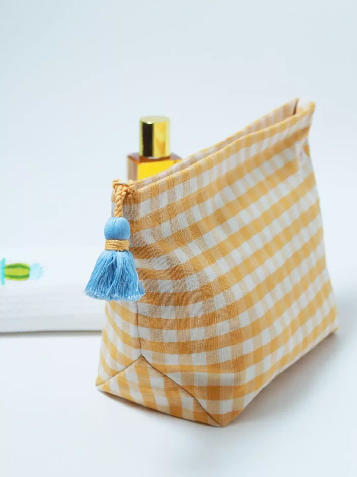 yellow checks toiletry bag with tassel